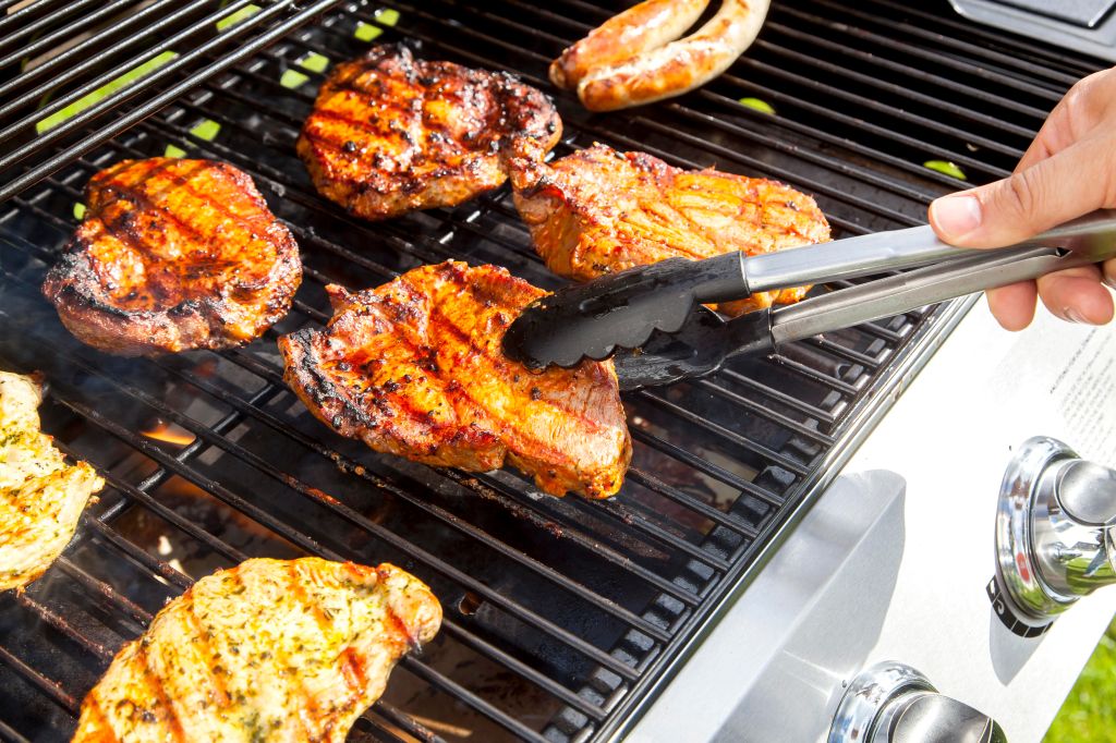 Pork steaks on a gas grill, Germany
