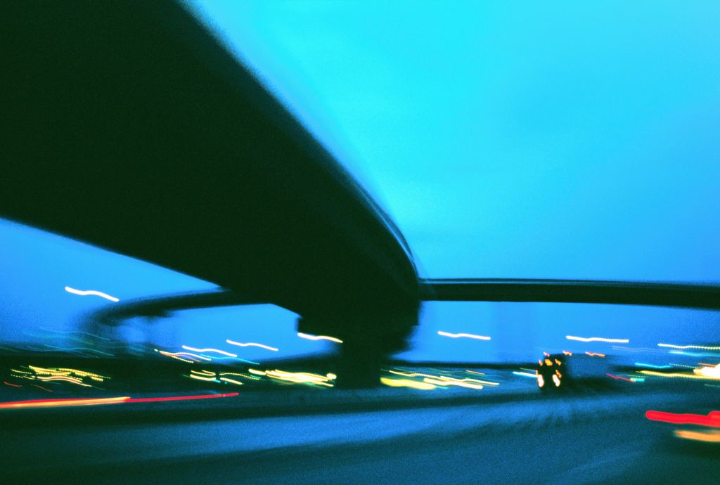 Traffic on highway, dusk (blurred motion, digital enhancement)
