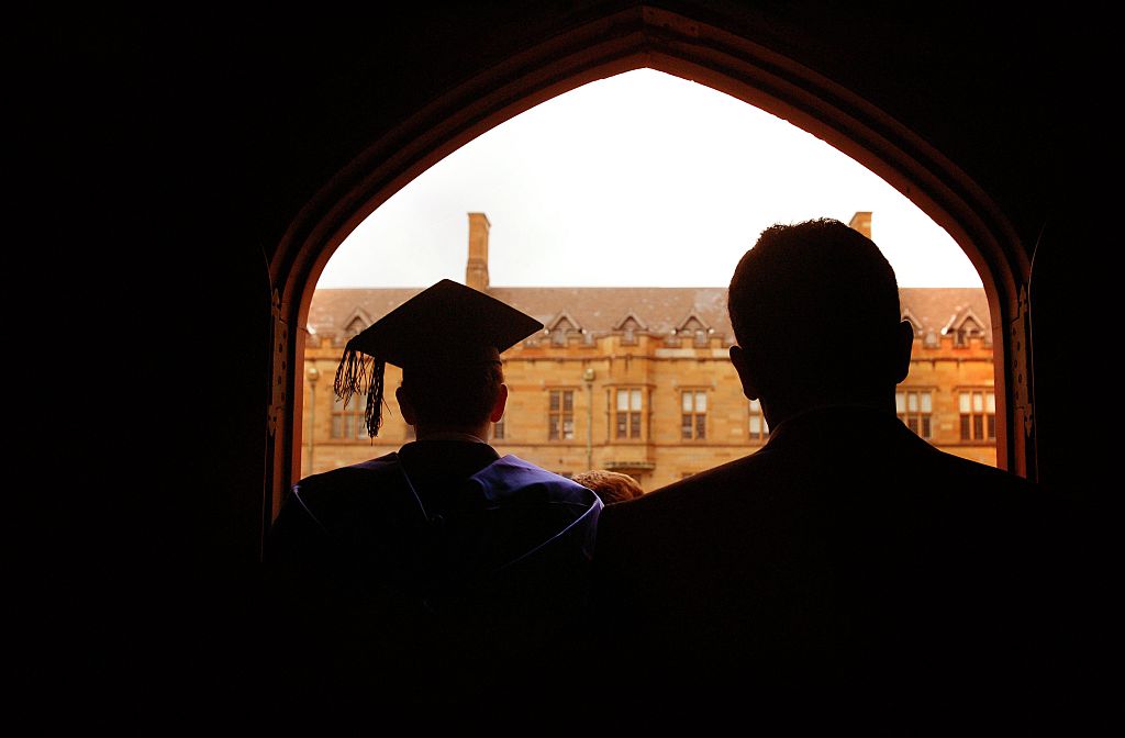 A graduating student enjoys the view, 24 November 2006. THE AGE Picture by LOUI